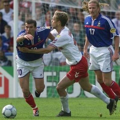 Photo Credit: FIFA World Cup 2002 web site, photo of Danish player grabbing France's Zidane.