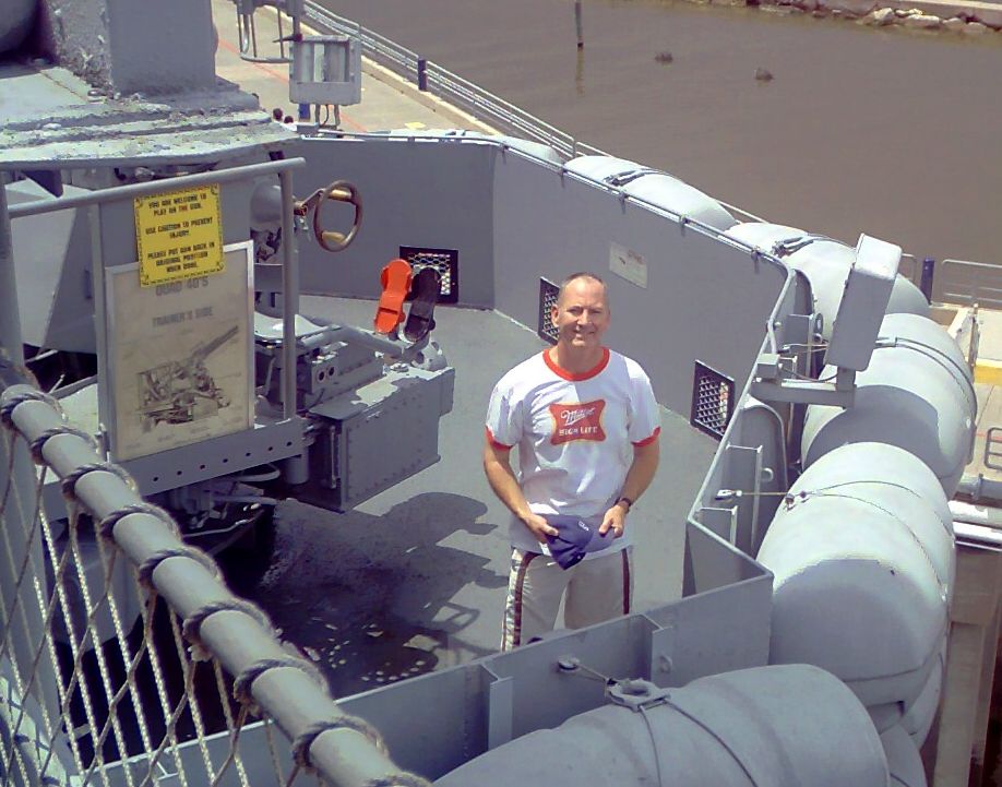 Mike Kimbro sports his Miller High Life attire on board the USS Lexington in Texas' Corpus Christi Bay.