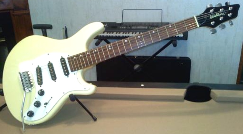 Washburn Bantam Series Model BT-3 electric guitar with Ivory finish and white pickguard and 3 single coil pickups