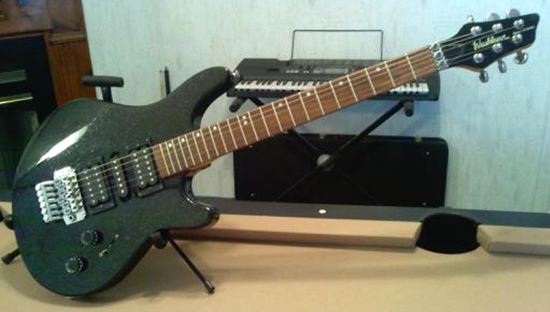 Washburn Maverick Series Model BT-6 with metallic black sparkle finish and floyd rose tremolo and locking nut