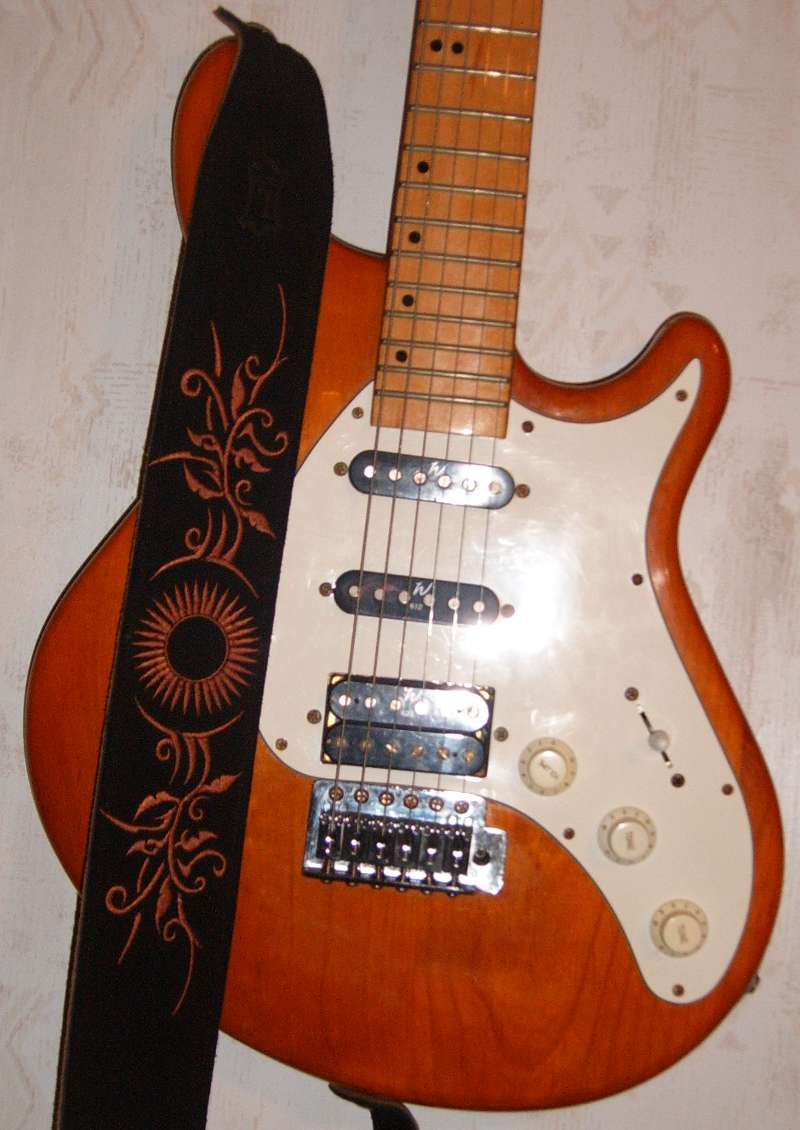 Washburn Billy T. model with a gorgeous leather Levy guitar strap.