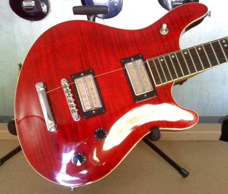 The body of the Washburn BT-8 electric guitar featuring the upgraded DeArmond USA Gold Tone pickups, which were removed from a De Armond Les Paul style guitar.