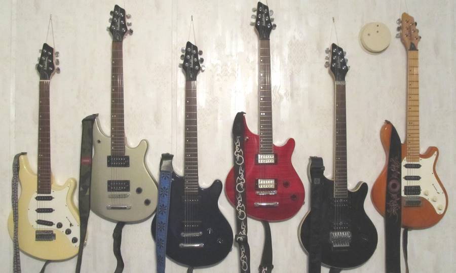 My Washburn BT-Series guitar collection, including a Washburn Bantum BT-3, a Washburn Maverick BT-2 with an HB-102 Duncan Designed pickup set, a Washburn Maverick Series BT-2 with P90's, a Washburn Maverick Series BT-8 with DeArmand USA pickups, Washburn Maverick Series BT-10, and Washburn BillyT with 600 Series PUPs.